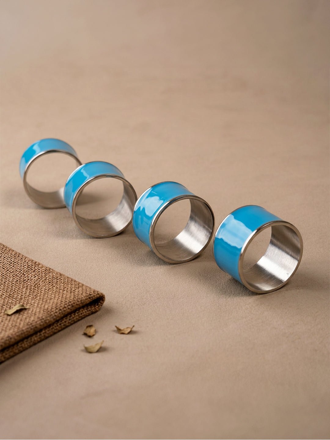 4-Piece Blue Enamel & Stainless Steel Napkin Ring Set - The Golden Theory Main image