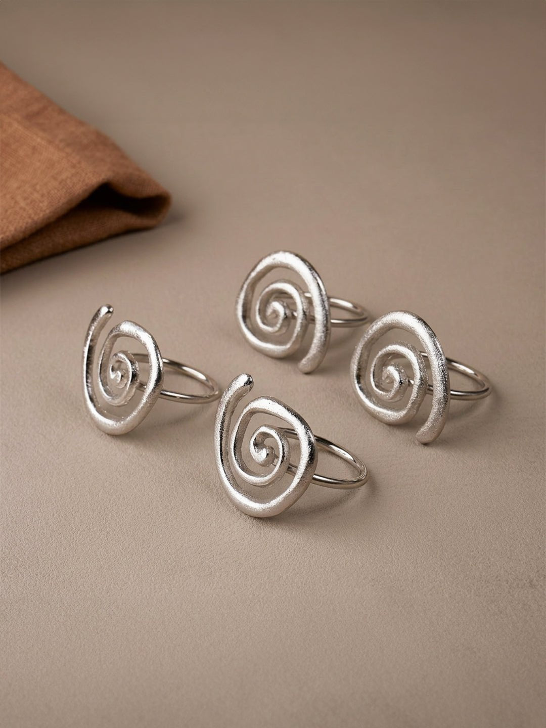 4-Piece Stainless Steel Spiral Napkin Ring Set - The Golden Theory