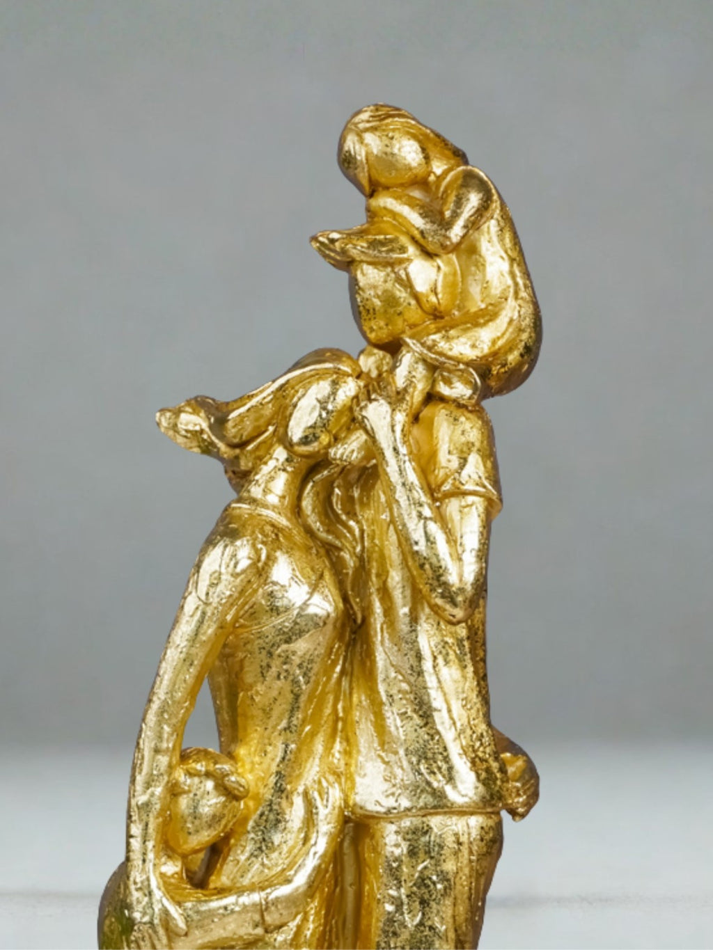 Golden Family Embrace Sculpture