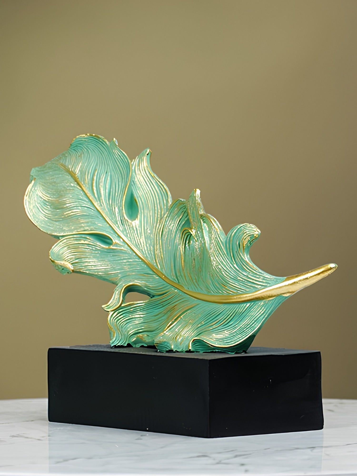Green and Gold Feather Sculpture with Artistic Flow Design Secondary image