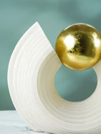 White Tiered Arch Sculpture with Gold Sphere