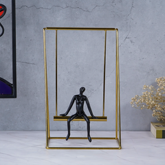 Black Figure on Gold Swing