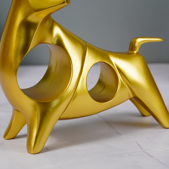 Gold Bull Sculpture with Geometric Cutouts