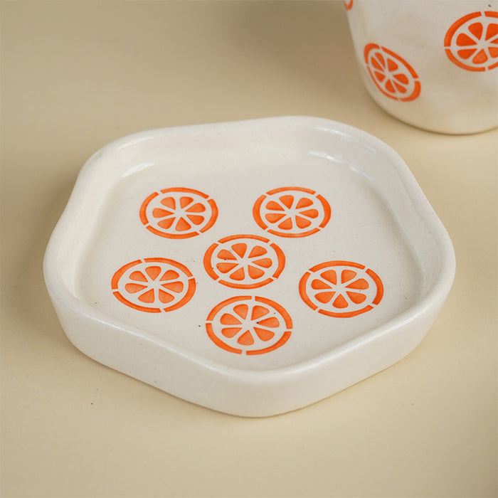 Cream Ceramic Cup with Orange Slice Motif