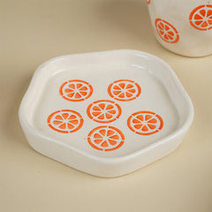 Cream Ceramic Cup with Orange Slice Motif