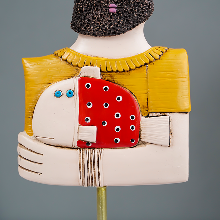 Abstract Bearded Man Sculpture with Red Polka Dot Fish