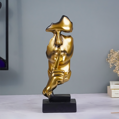 Gold Face Sculpture with Shhh Gesture