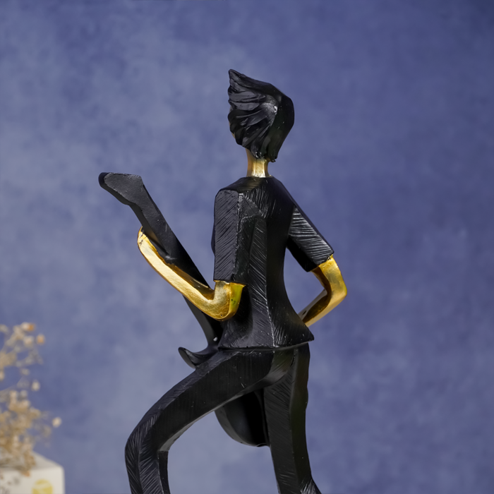 Black and Gold Guitar Player Sculpture - Modern Musician Decor