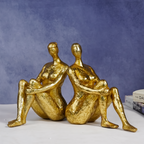 Gold Abstract Bookend Sculptures - Unique Sitting Figures Design