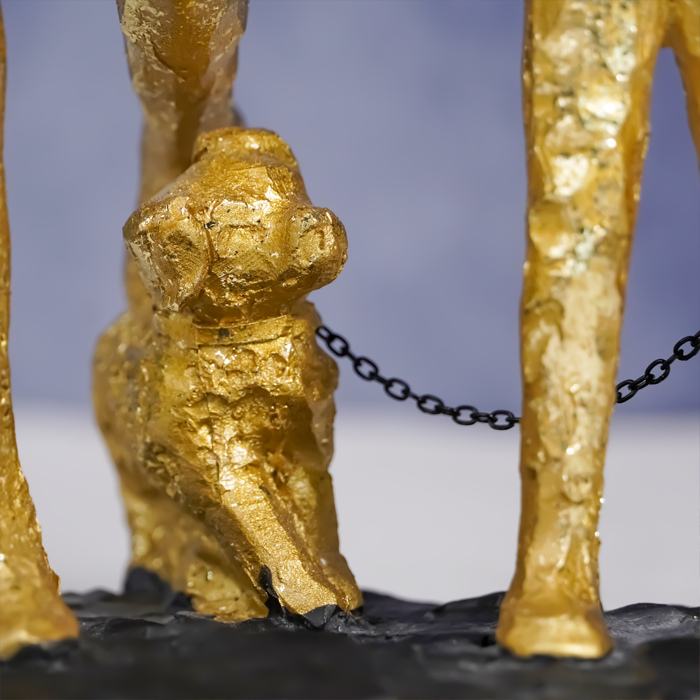 Gold Family Sculpture with Balloon - Joyful Moments in Art