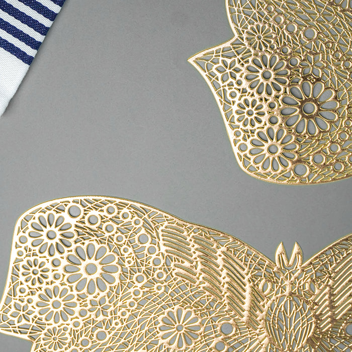 Gold Butterfly Cutout Table Mat with Intricate Floral Detailing