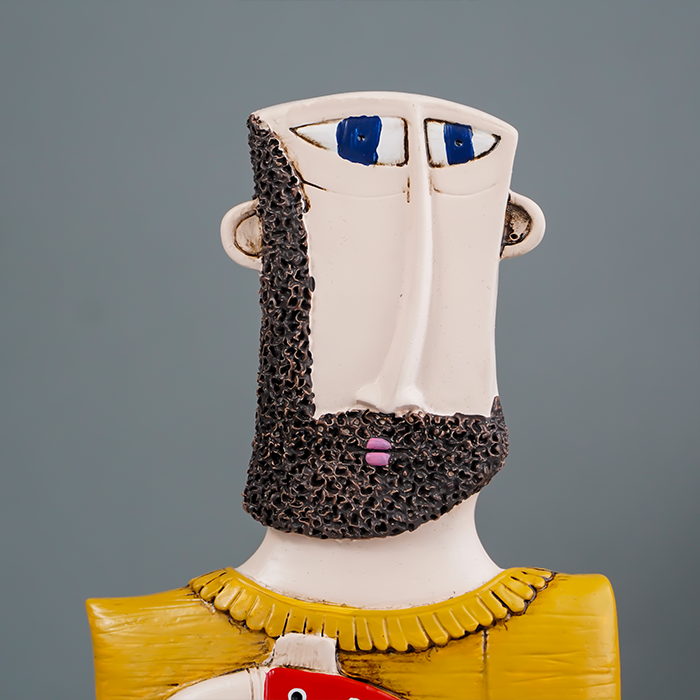 Abstract Bearded Man Sculpture with Red Polka Dot Fish