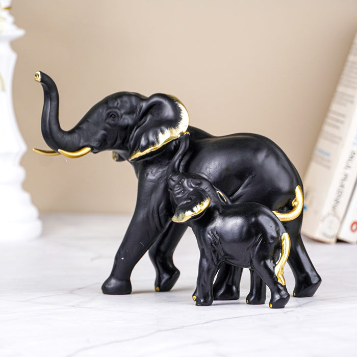 Black Elephant Figurine Set with Gold Accents