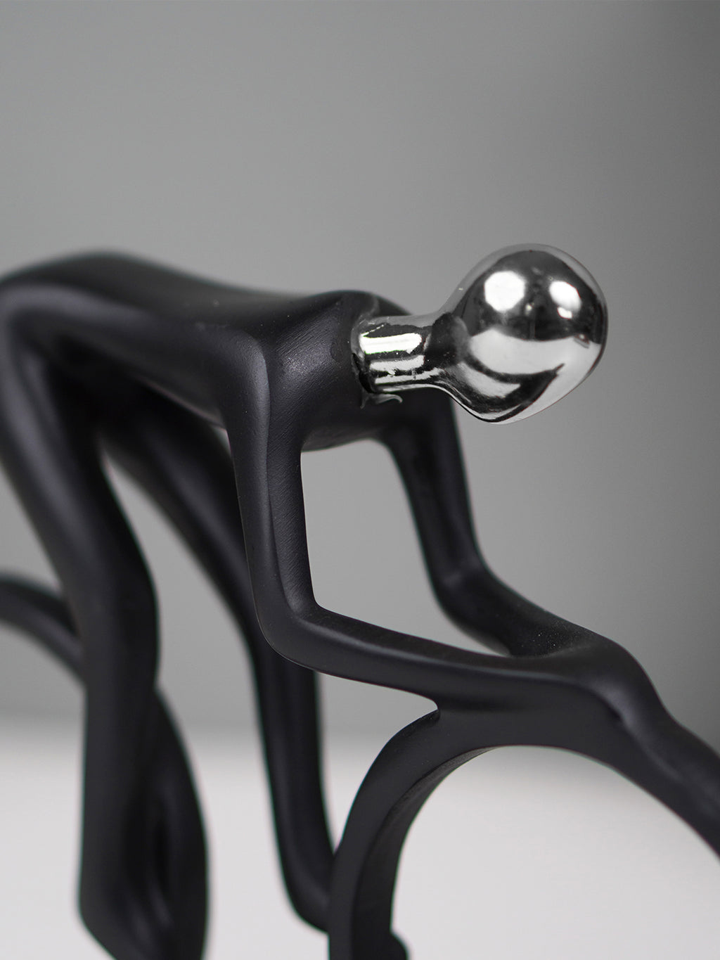 Black and Silver Cyclist Sculpture