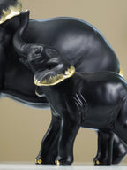 Black Elephant Figurine Set with Gold Accents
