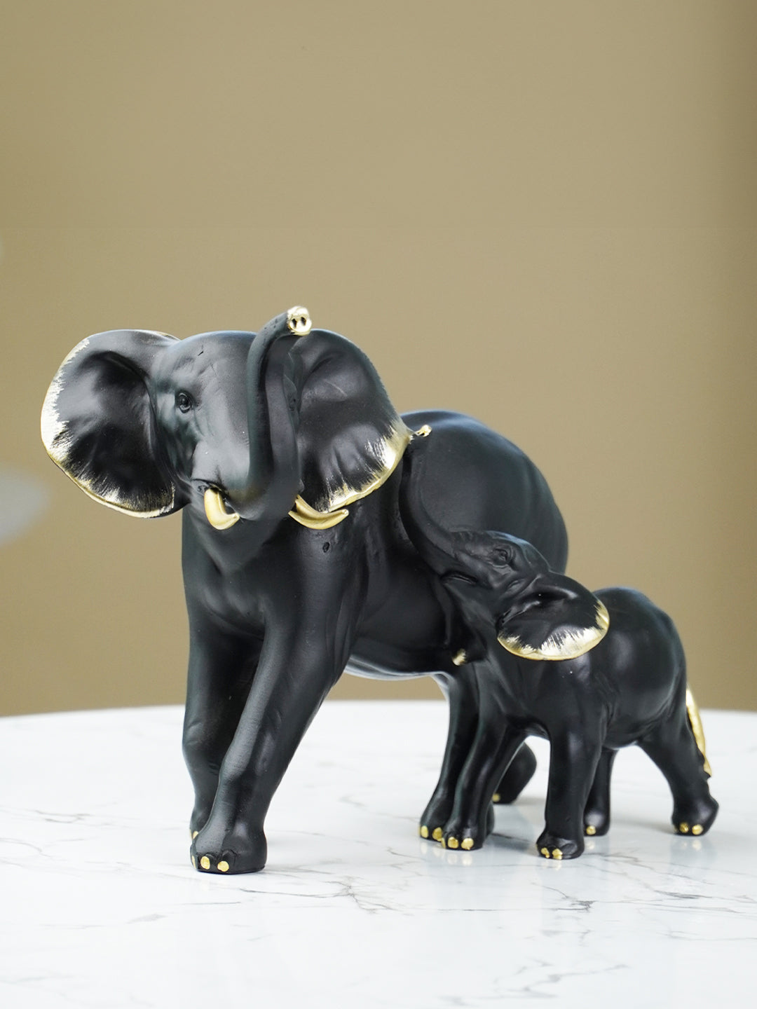 Black Elephant Figurine Set with Gold Accents
