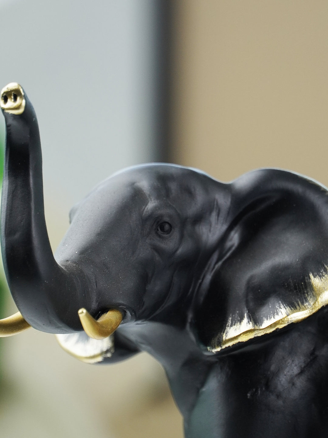 Black Elephant Figurine Set with Gold Accents