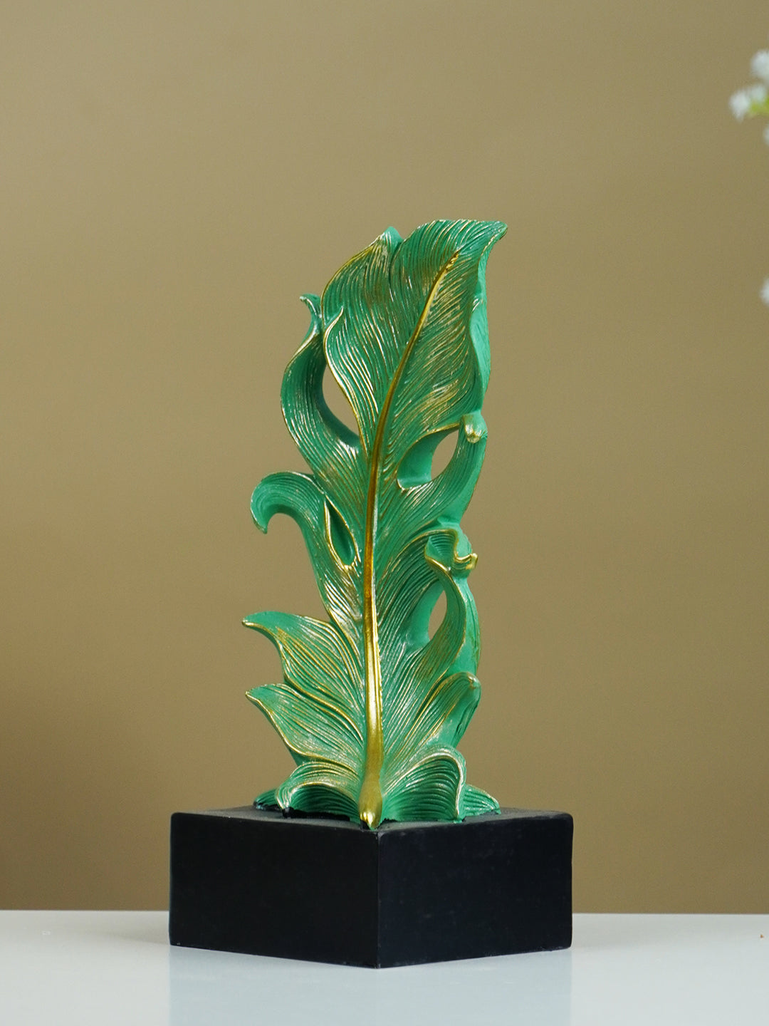 Green Leaf-Inspired Decorative Sculpture with Golden Accents Main image