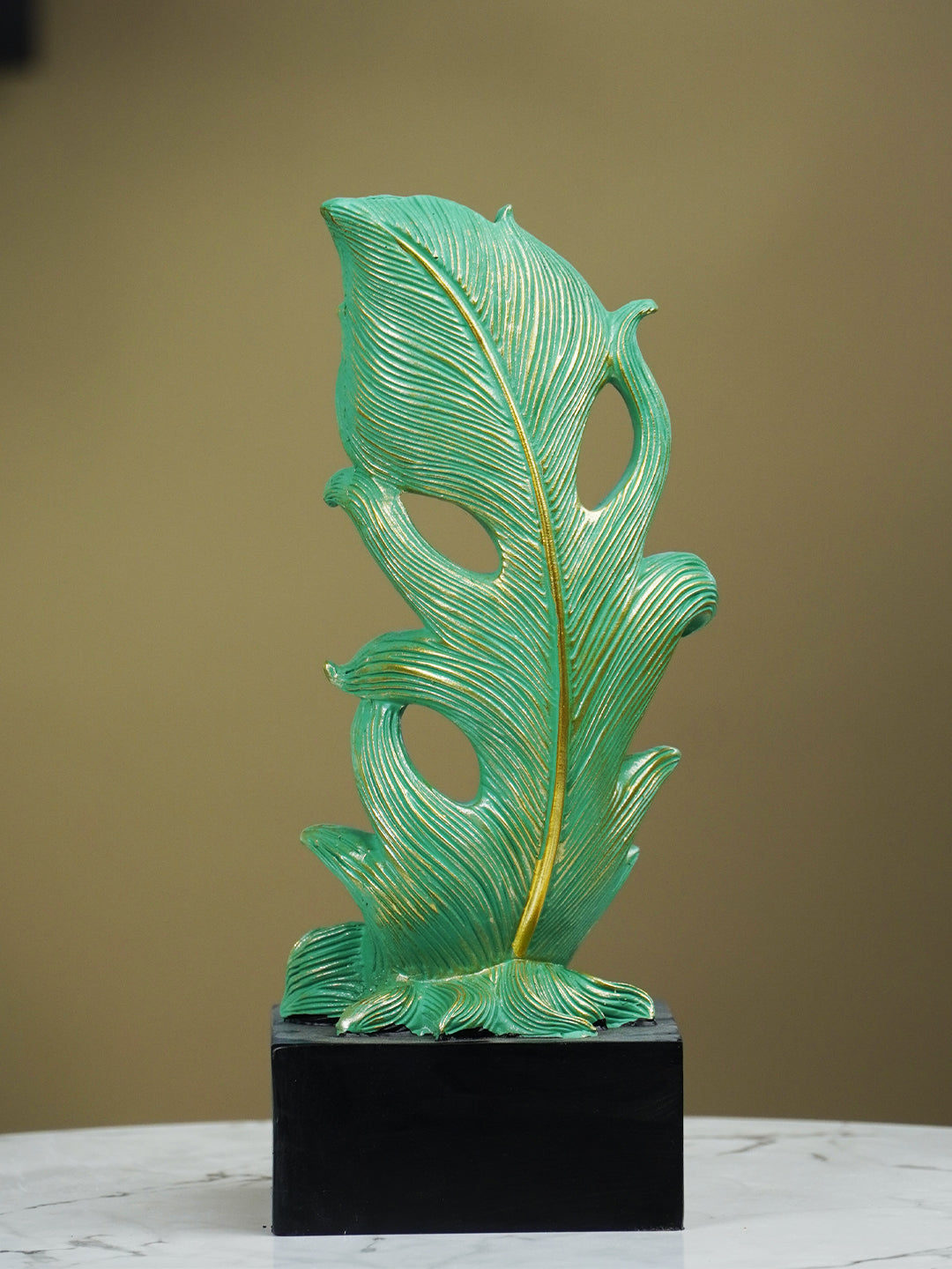 Green Leaf-Inspired Decorative Sculpture with Golden Accents Secondary image