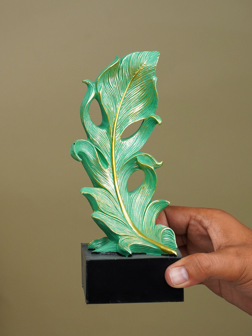 Green Leaf-Inspired Decorative Sculpture with Golden Accents