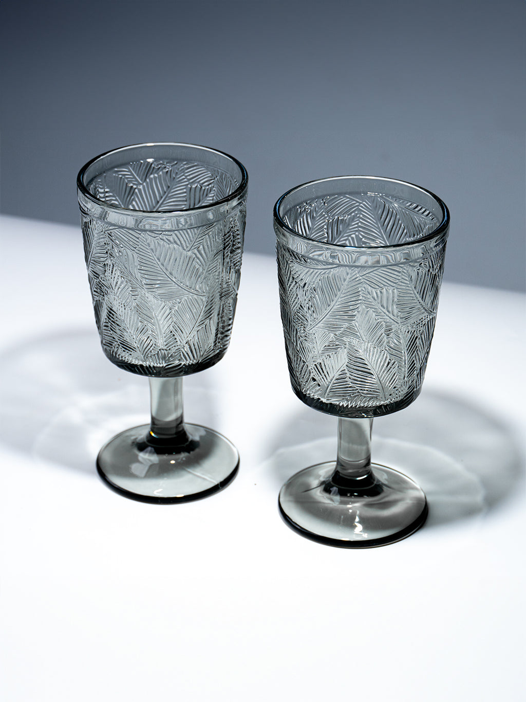 Smoky Black Palm Leaf Embossed Glass Goblet