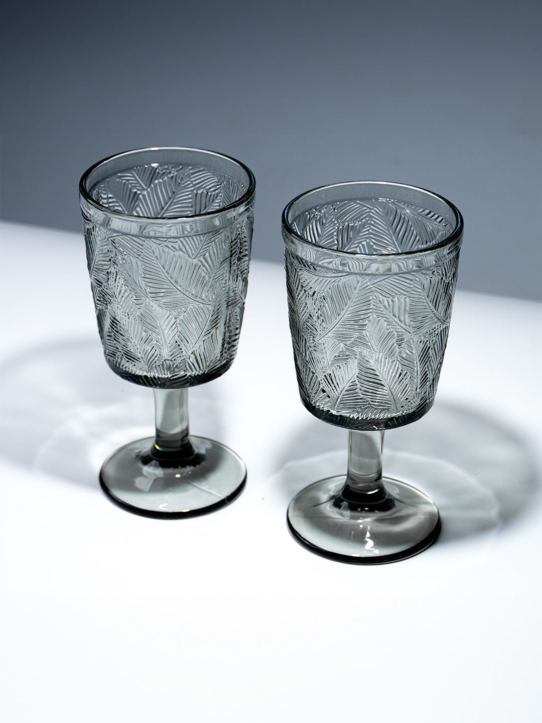 Smoky Black Palm Leaf Embossed Glass Goblet