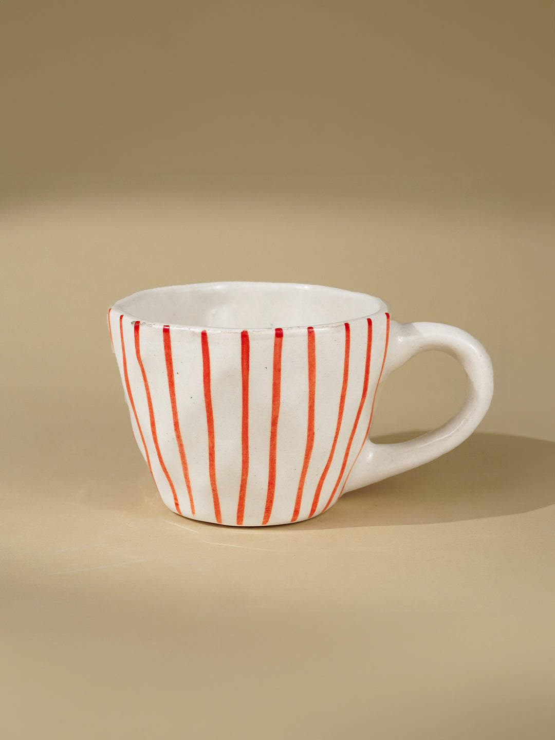 White Ceramic Cup with Hand-Painted Red Stripes Main image