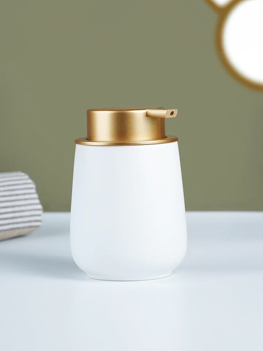 Elegant White Soap Dispenser with Gold Accents
