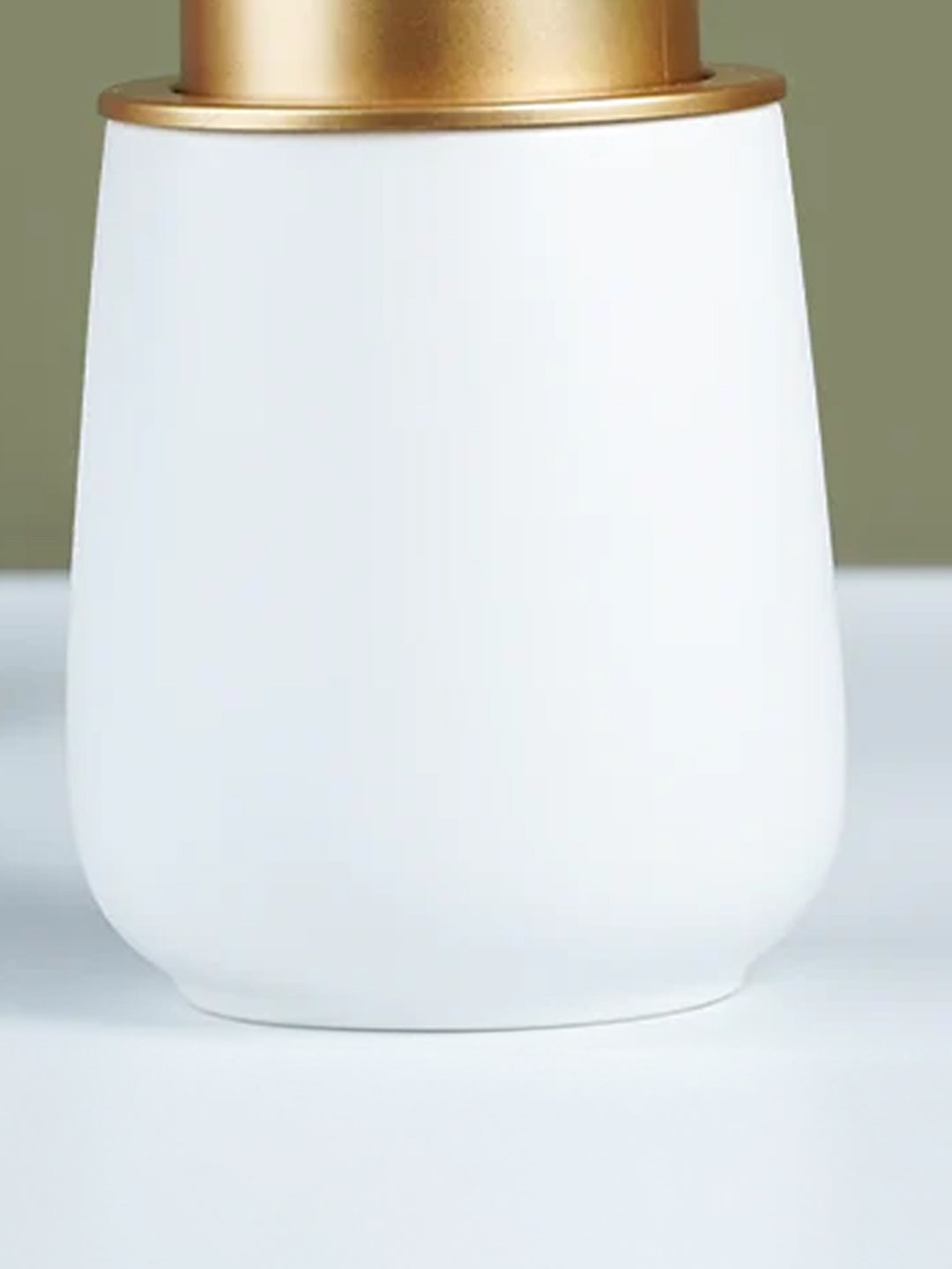 Elegant White Soap Dispenser with Gold Accents