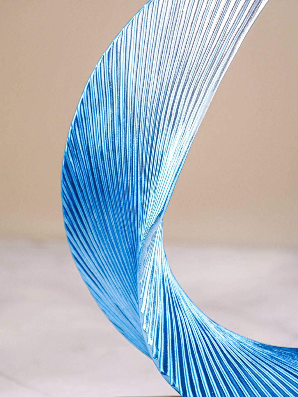 Blue and Silver Abstract Wave Sculpture