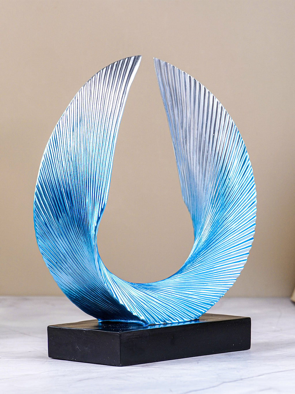Blue and Silver Abstract Wave Sculpture