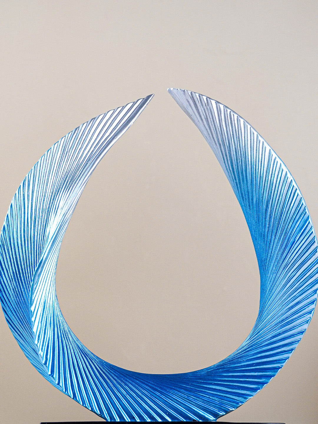 Blue and Silver Abstract Wave Sculpture