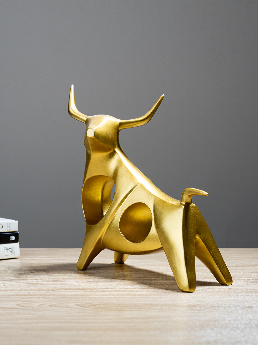 Gold Bull Sculpture with Geometric Cutouts Secondary image