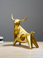 Gold Bull Sculpture with Geometric Cutouts