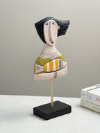 Abstract Woman Sculpture with Orange Striped Fish