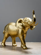 Golden Elephant Figurine with Raised Trunk