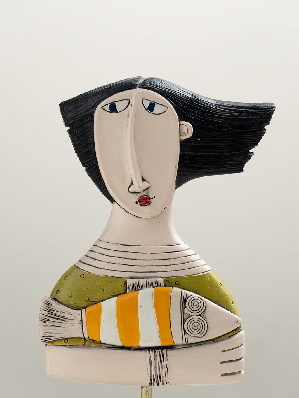 Abstract Woman Sculpture with Orange Striped Fish