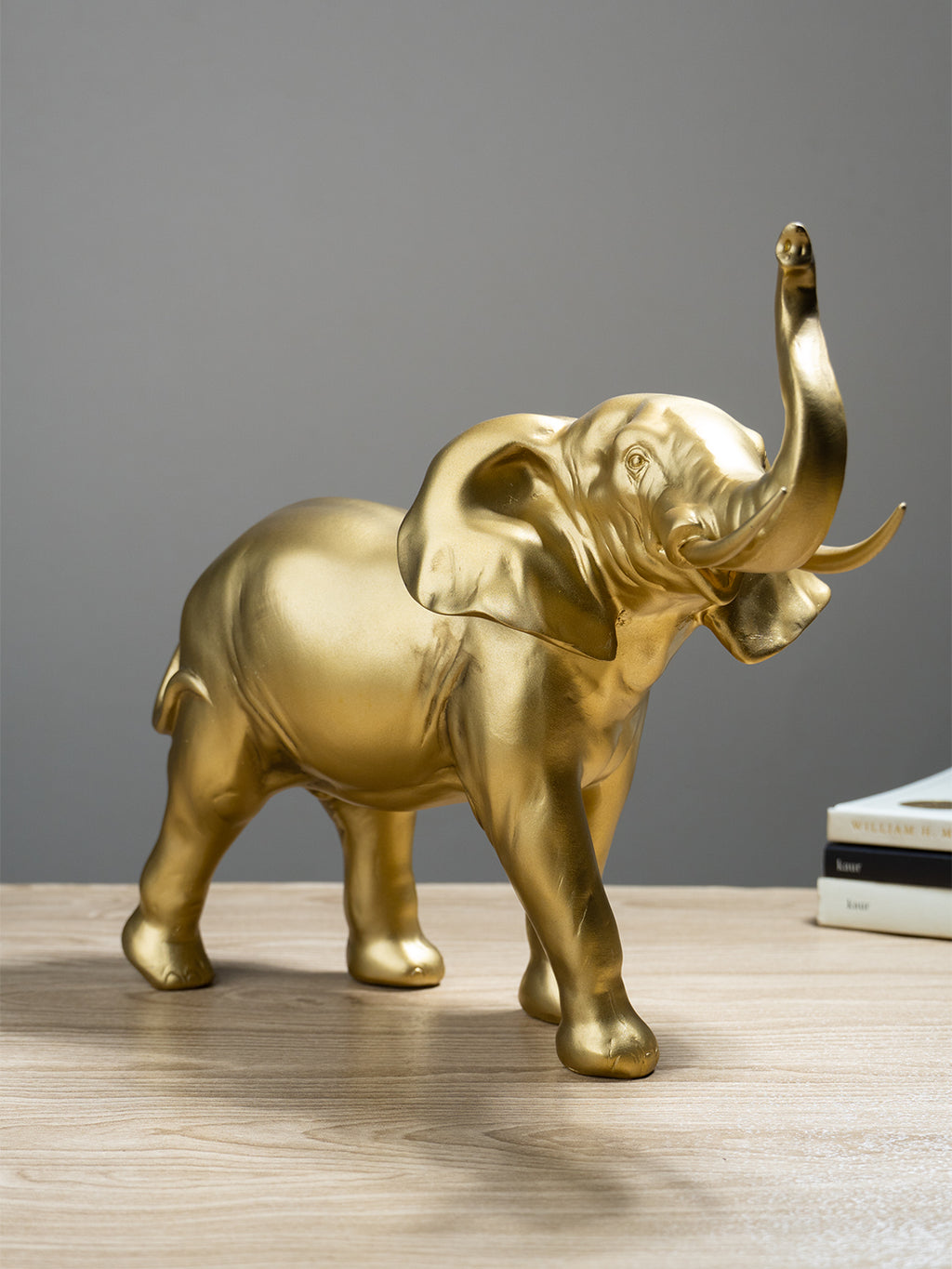 Golden Elephant Figurine with Raised Trunk