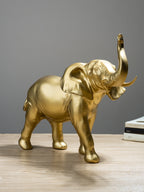 Golden Elephant Figurine with Raised Trunk