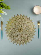 Gold Floral Cutout Table Mat with Intricate Petal Design