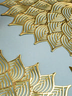 Gold Floral Cutout Table Mat with Intricate Petal Design