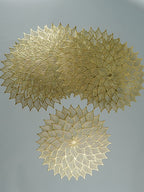 Gold Floral Cutout Table Mat with Intricate Petal Design