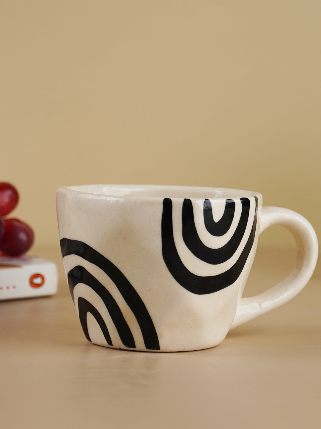 White Ceramic Mug with Hand-Painted Black Arch Design