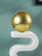 White Marble-Finish Zigzag Sculpture with Gold Sphere