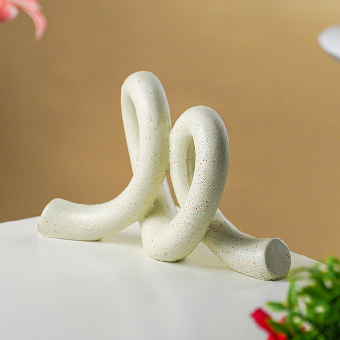 Marble Finish White Intertwined Loop Sculpture