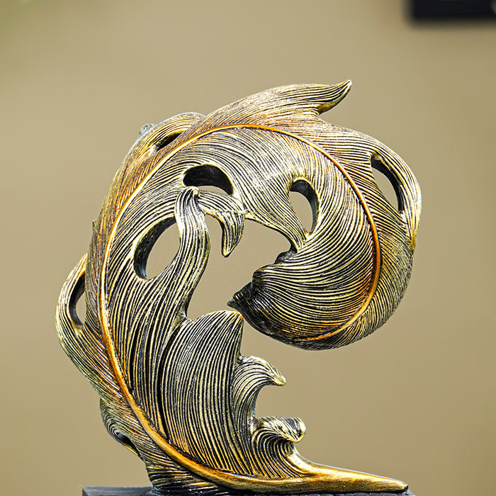 Golden Leaf-Inspired Decorative Sculpture on Black Base
