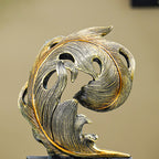 Golden Leaf-Inspired Decorative Sculpture on Black Base