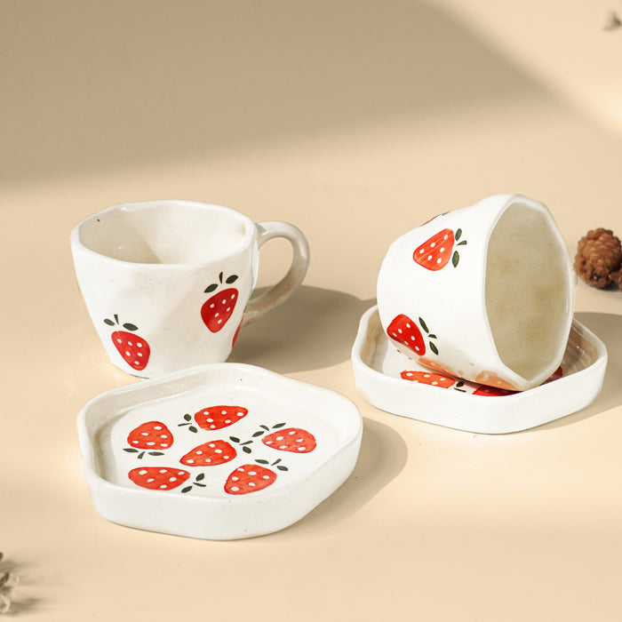 Elegant White Ceramic Cup & Saucer Set with Strawberry Print