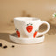 Elegant White Ceramic Cup & Saucer Set with Strawberry Print