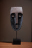 Tribal Wood-Look Mask Sculpture – Angular Face Statue